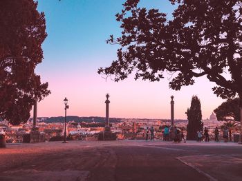 Cityscape against sky during sunset