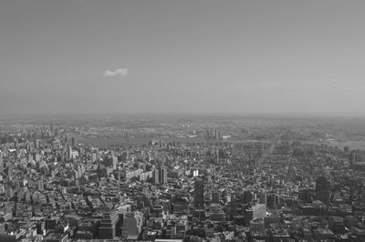 Aerial view of cityscape against sky