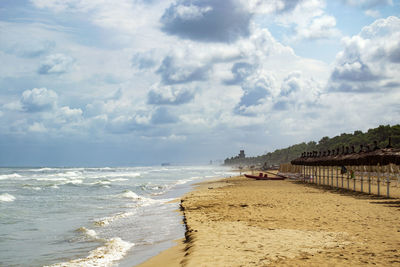 Scenic view of beach against sky