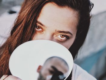 Close-up portrait of a young woman