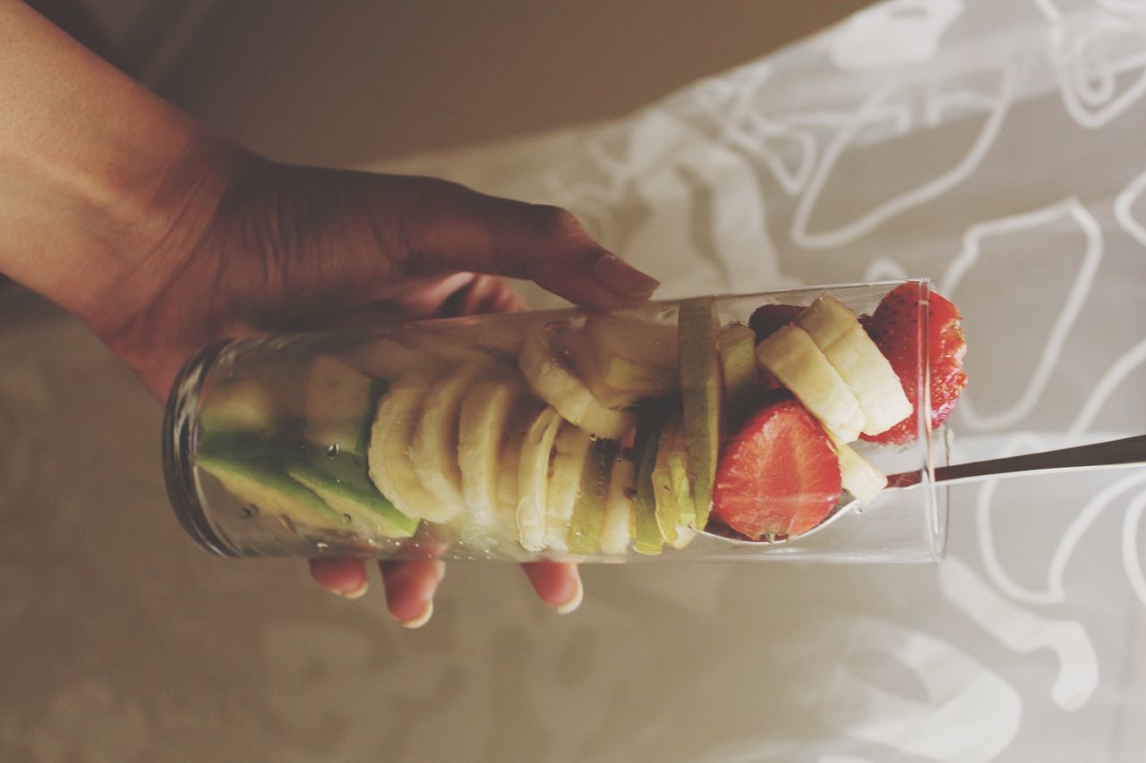 food and drink, food, indoors, person, freshness, healthy eating, holding, cropped, part of, still life, close-up, fruit, preparation, table, indulgence, raw food, ready-to-eat