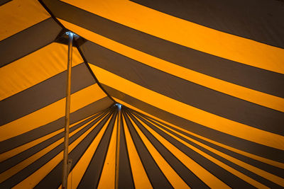 Full frame shot of yellow umbrella against sky
