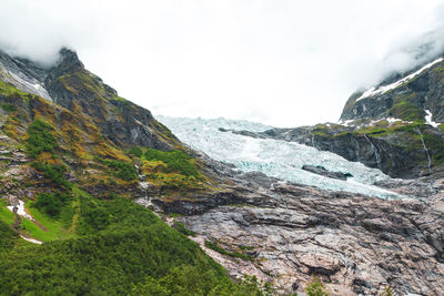 Melting briksdal glacier in norway, close up. panorama from bottom to top. norway