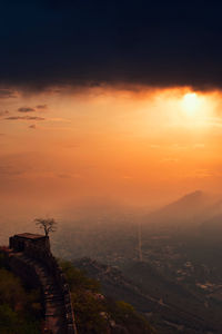 High angle view of city during sunset