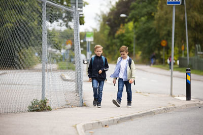 Boys walking together