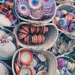 Full frame shot of colorful diyas for sale at market stall