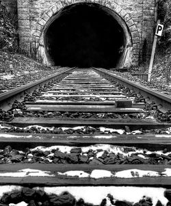 Railroad tracks in tunnel