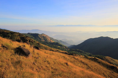Scenic view of mountains against sky during sunset
