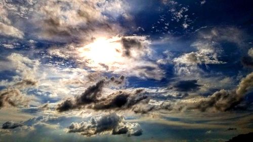 Low angle view of clouds in sky during sunset