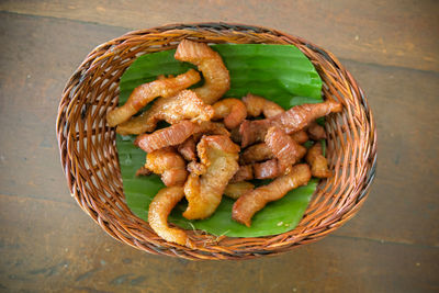 High angle view of wicker basket on table