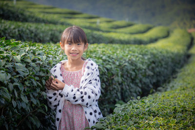 Woman smiling on field