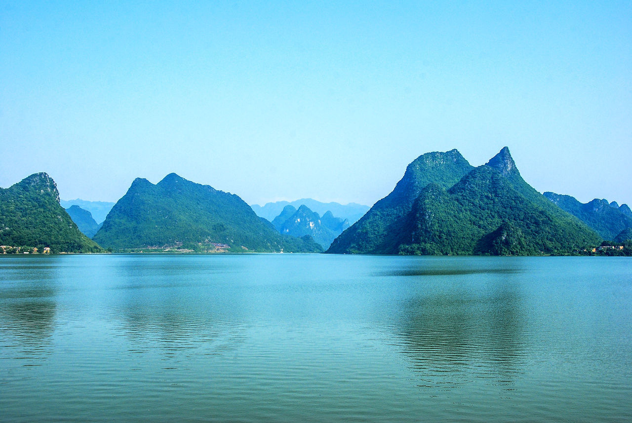 SCENIC VIEW OF LAKE AGAINST CLEAR BLUE SKY