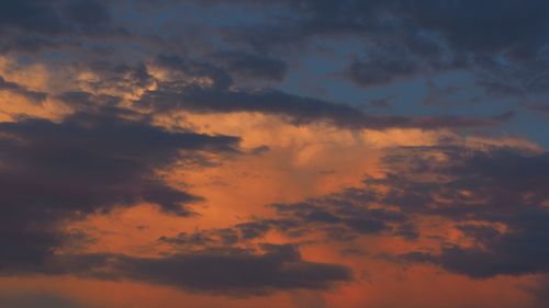 Low angle view of dramatic sky during sunset