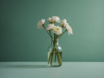 Close-up of flowers in vase on table