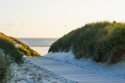 Scenic view of sea against clear sky