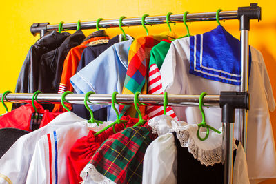 Close-up of clothes drying on rack