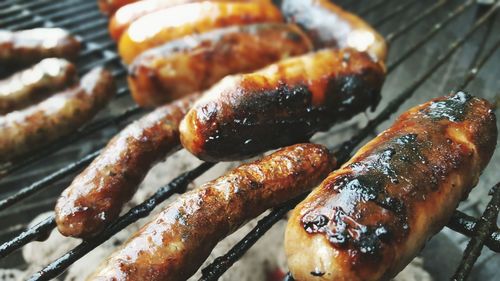 Close-up of meat on barbecue grill