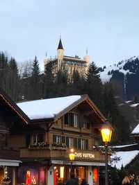 Building against sky during winter