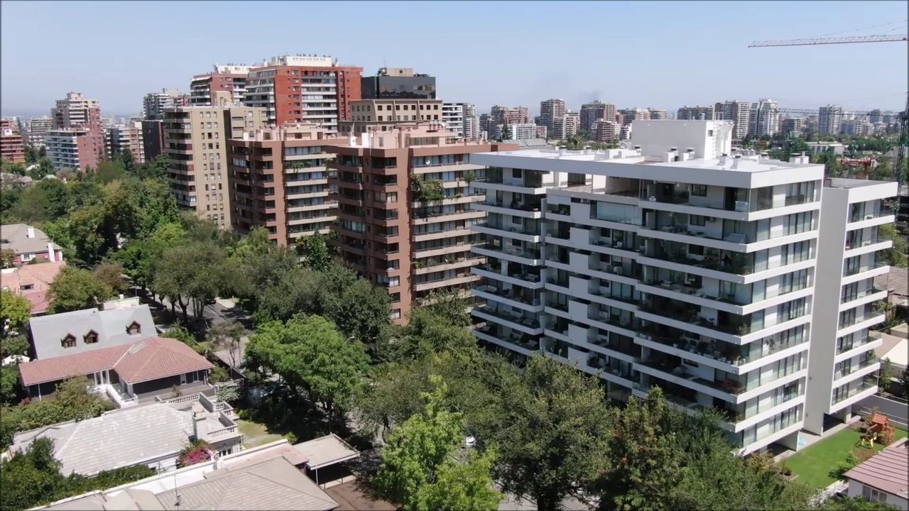 HIGH ANGLE VIEW OF RESIDENTIAL BUILDINGS AGAINST SKY