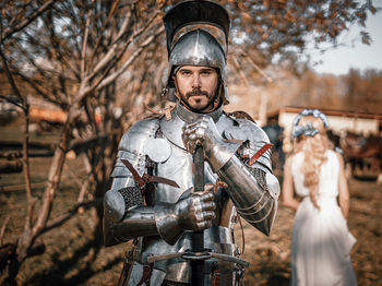 Portrait of warrior standing outdoors