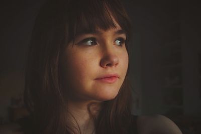 Close-up portrait of young woman