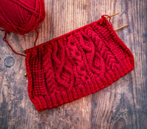 Close-up of multi colored umbrella on wooden table