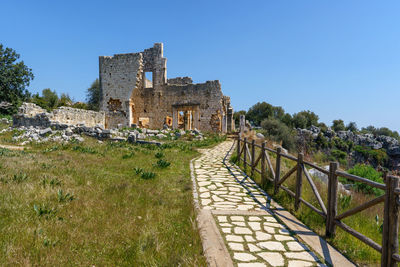 View of old ruins against clear sky