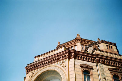 Low angle view of historic building against clear sky