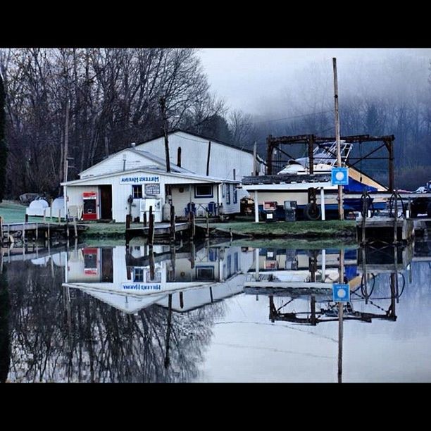 transfer print, auto post production filter, built structure, transportation, architecture, tree, mode of transport, building exterior, reflection, day, sky, nautical vessel, outdoors, house, water, moored, no people, snow, winter, nature