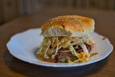 Close-up of burger in plate on table