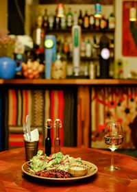 Wine glasses on table at restaurant