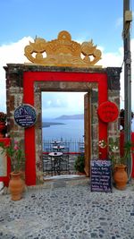 Entrance of temple against building