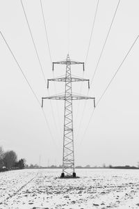 Electricity pylon against sky