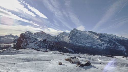 Scenic view of snowcapped mountains against sky