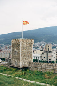 Macedonian flag on a tower of a stone castle