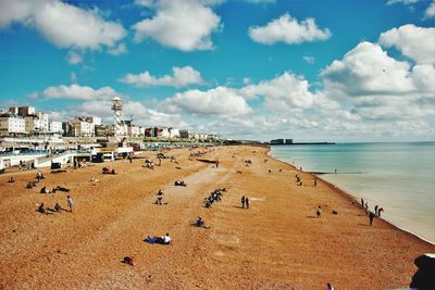 View of beach against cloudy sky