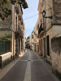 Narrow alley along buildings