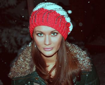 Portrait of smiling young woman during winter