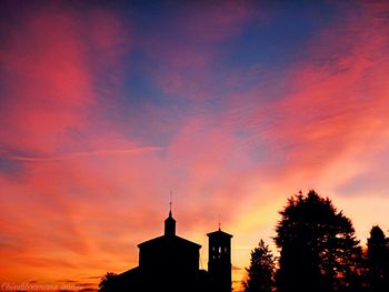 Silhouette of church at sunset