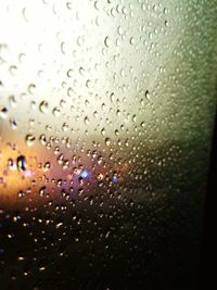 Close-up of water drops on glass