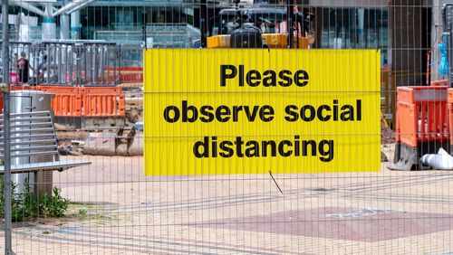 Pandemic social distancing signs in coventry