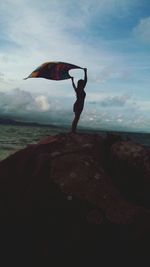 Woman standing on beach