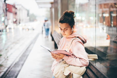 Young woman using mobile phone