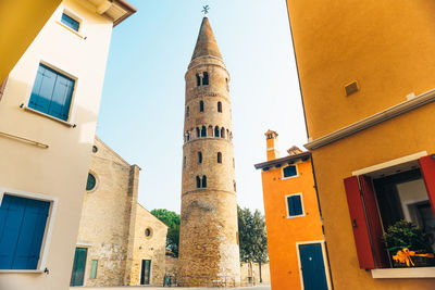 Low angle view of buildings against clear sky