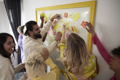 Diverse team brainstorming during business meeting in conference room