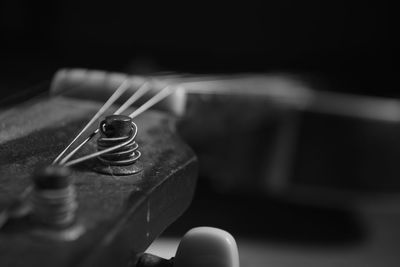 Close-up of guitar on table