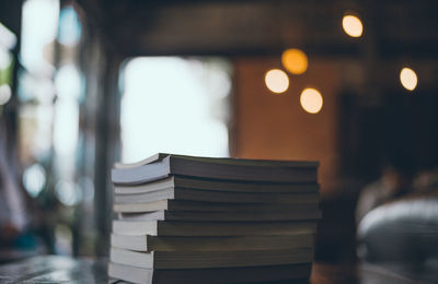 Close-up of books on table at home