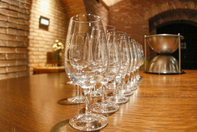 Close-up of wineglasses on table