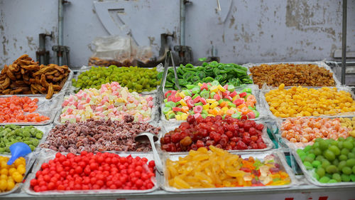 Hanoi sugared or salted dry fruits for sale at the market in ha noi, vietnam