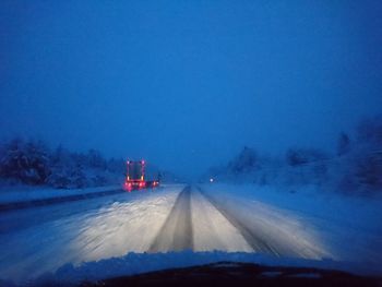 Road seen through car windshield